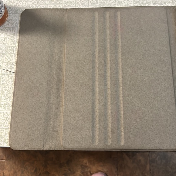 This a iPad case you can prop it up with any of the lines and the inside - Picture 4 of 5